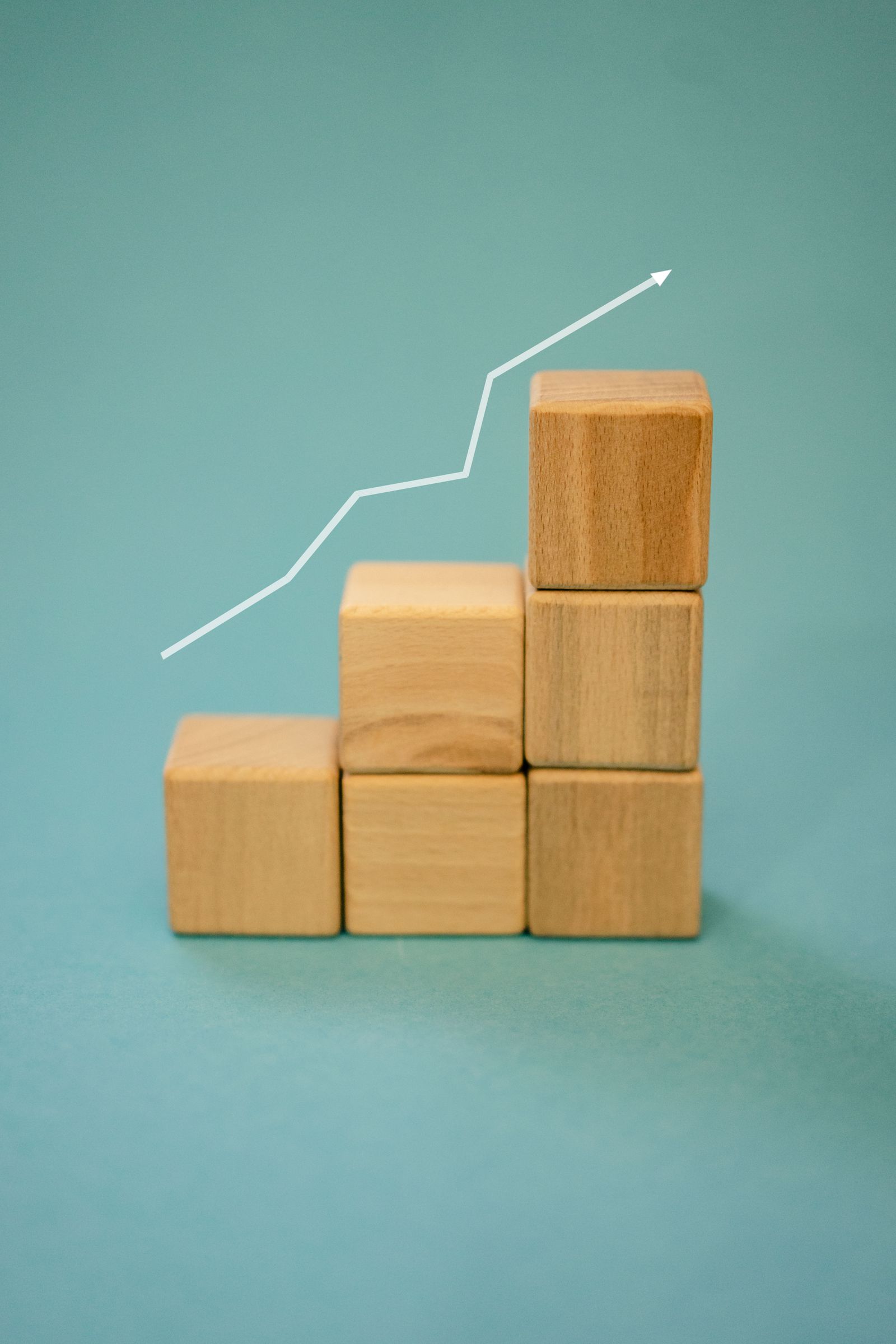 Ascending blocks with an upward line showing recovery